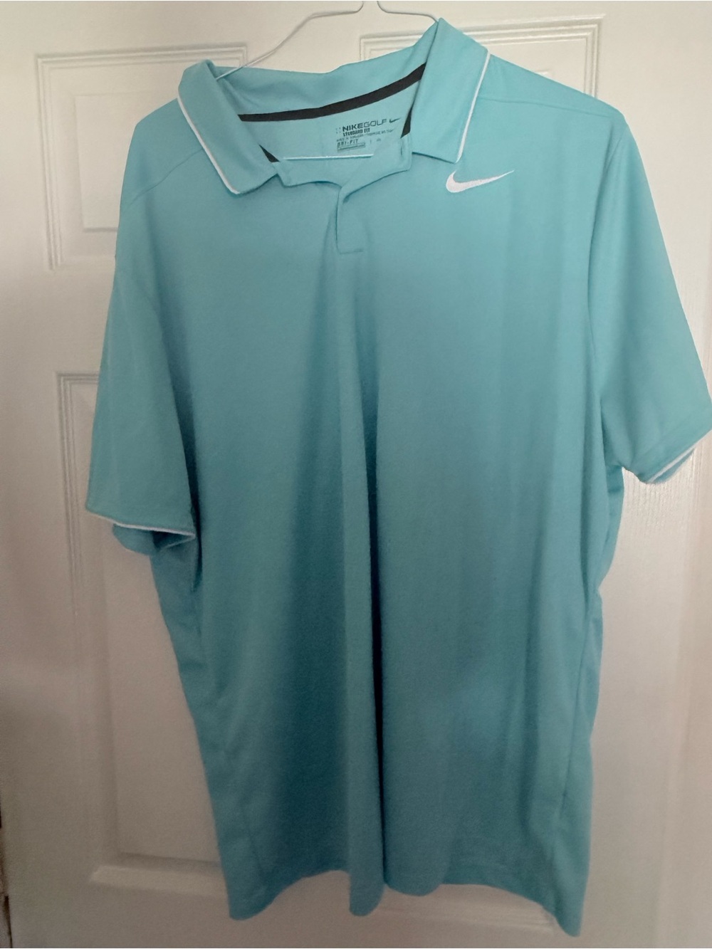 Nike Men’s Aqua Polo with White Swoosh